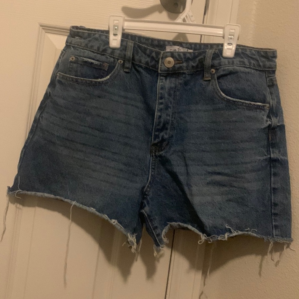Dark washed denim shorts. Brand new not with tags but never worn.